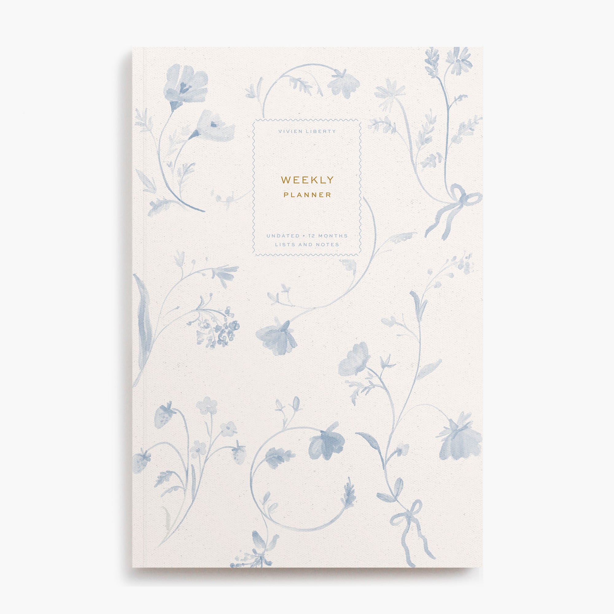 Cottagecore aesthetic book-bound planner notebook with monthly and weekly calendar, project timelines, goal tracking. Cover art style is floral pattern, toile, dutch, blue, delft, ribbon bows, wildflowers.